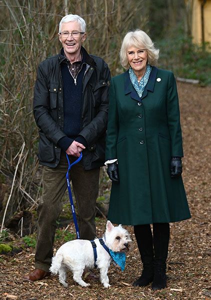 Queen Consort Camilla and Paul O'Grady smiling together