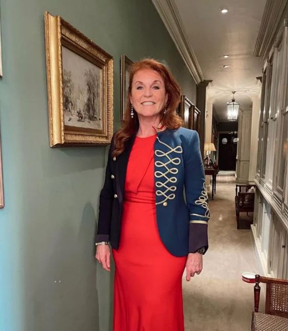 sarah ferguson pictured inside royal lodge wearing red dress and military jacket
