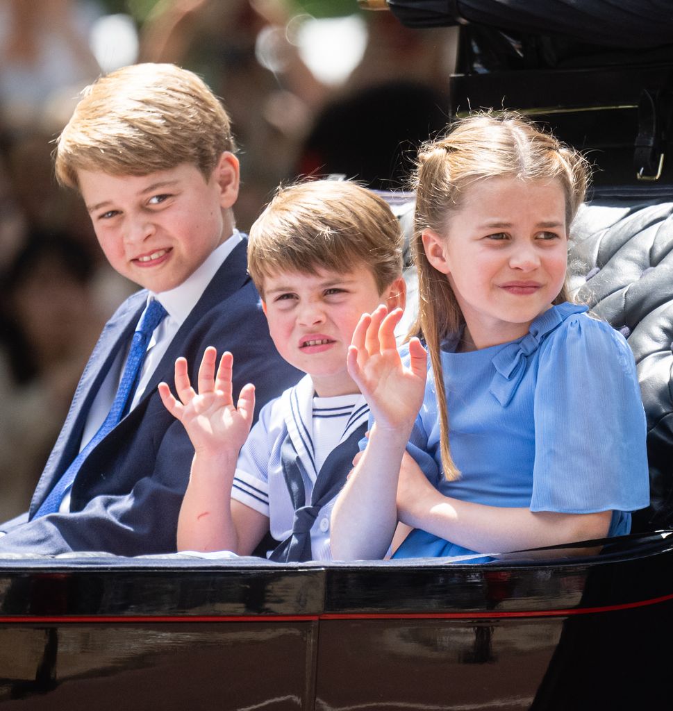  Prince George of Cambridge, Prince Louis of Cambridge and Princess Charlotte of Cambridge ride in a carriage during Trooping The Colour, the Queen's annual birthday parade