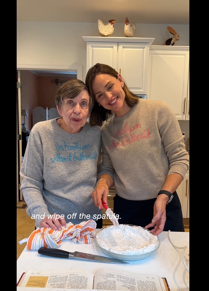 Jennifer and her mom smiling in the kitchen