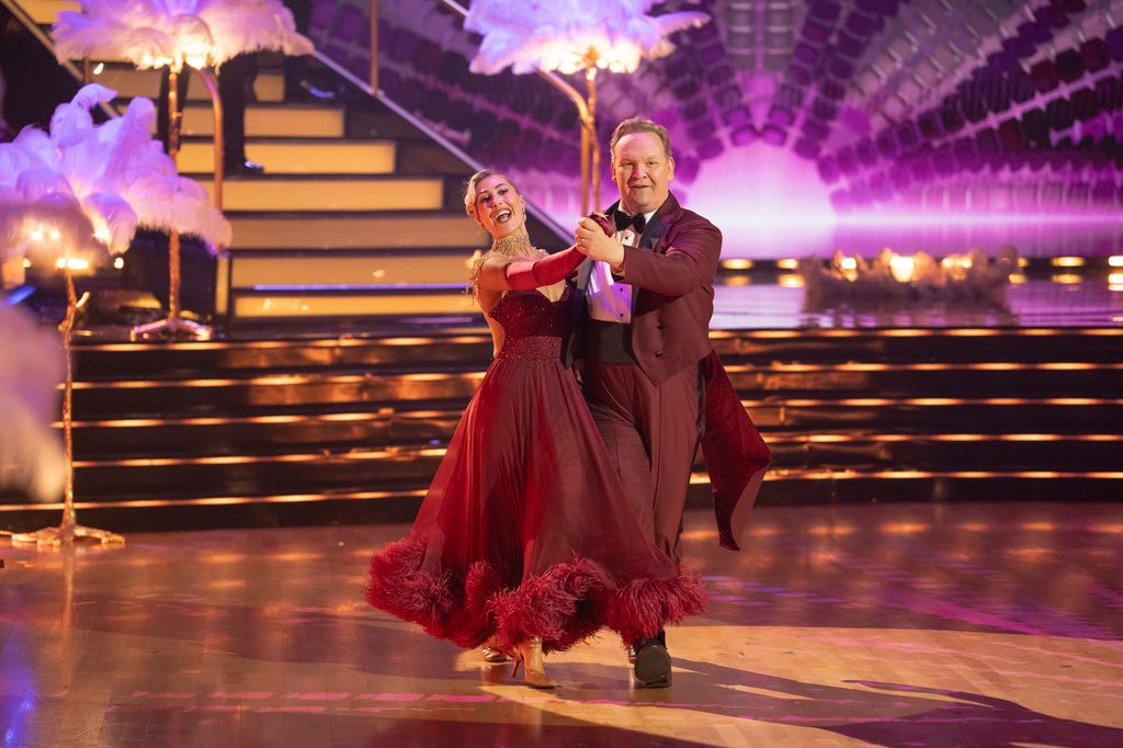 Andy Richter and Emma Slater perform on Dancing with the Stars for the show's 20th Birthday Party episode