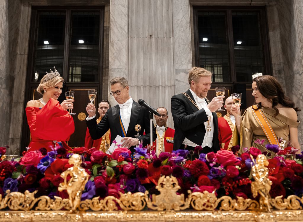 King Willem-Alexander (2ndR), Queen MÃ¡xima (L) , and Finnish President Alexander Stubb and his wife Suzanne Innes-Stubb attend a state banquet at the Royal Palace in Amsterdam on the first day of Stubb's two-day state visit to the Netherlands. (Photo by Remko de Waal / ANP / AFP via Getty Images) / Netherlands OUT