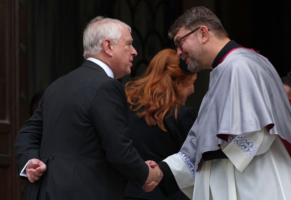Britain's Prince Andrew, Duke of York is greeted as he arrives to attend a Requiem Mass, a Catholic funeral service, for the late Katharine, Duchess of Kent, at Westminster Cathedral in London 