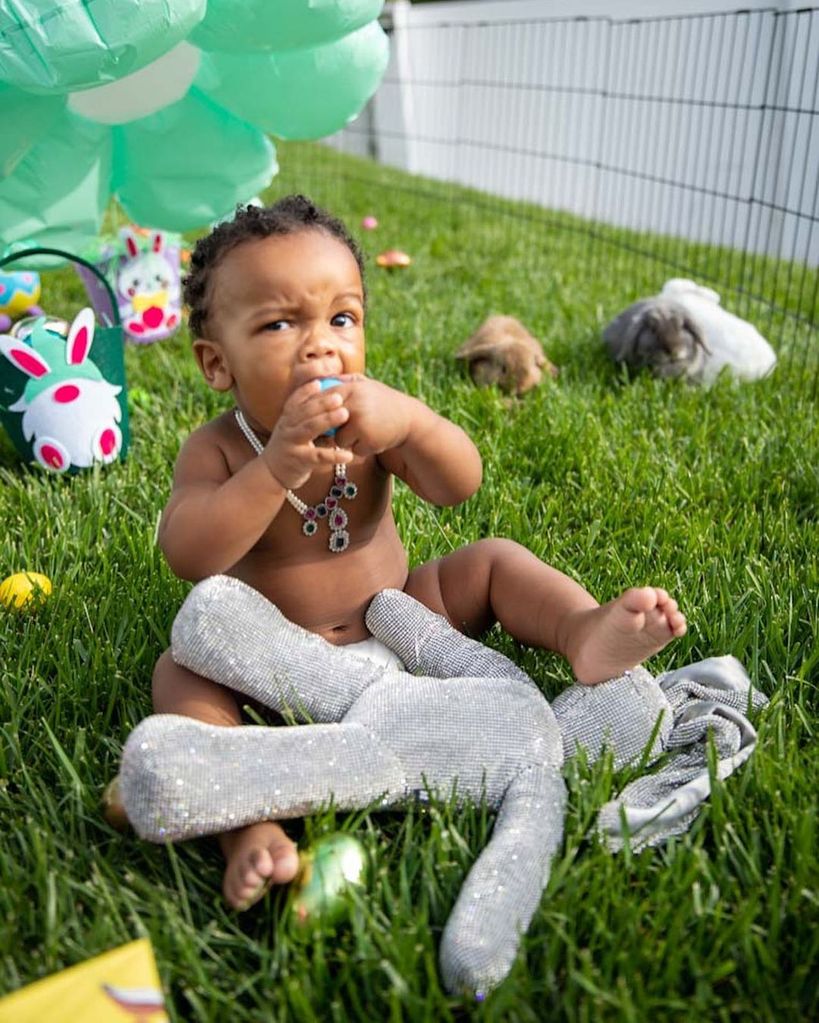 Rihanna's son chomps into his Easter egg