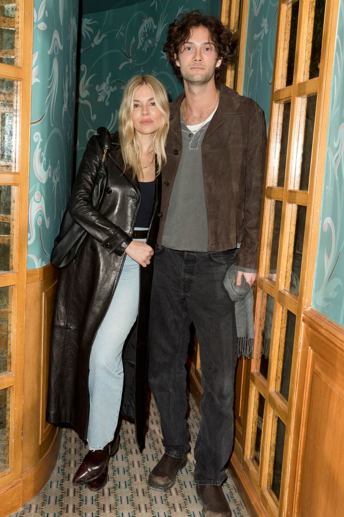 Sienna Miller and Oli Green at the Frame Dinner as part of Paris Ready to Wear Fashion Week at Caviar Kaspia on March 3, 2024 in Paris, France. 