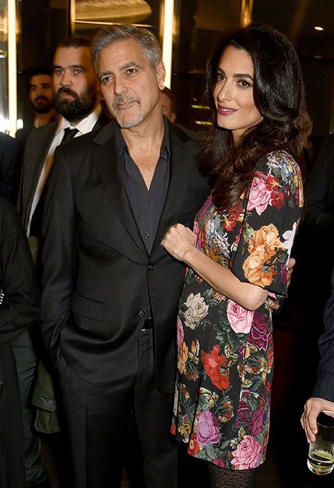 George Clooney Amal Clooney pregnant twins posing for photo 