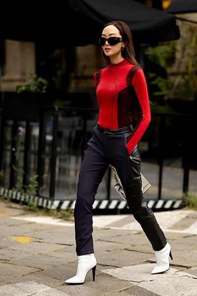 Woman Wearing Cigarette Trousers With White Boots