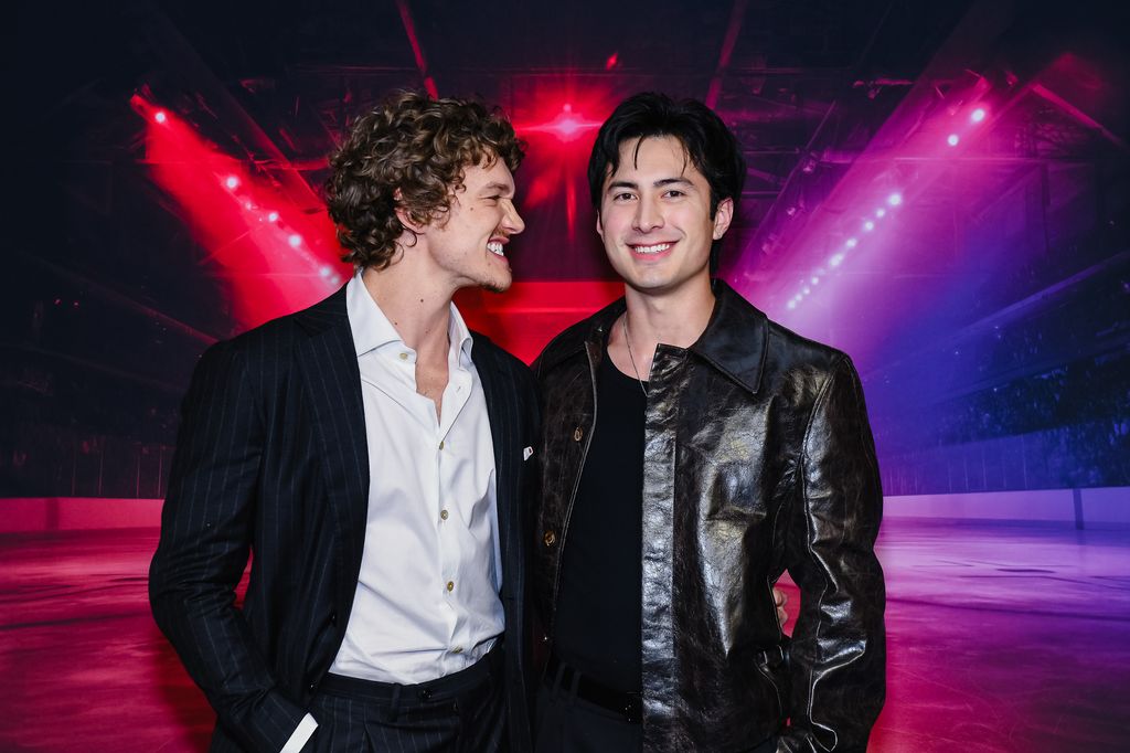 Connor Storrie standing with Hudson Williams