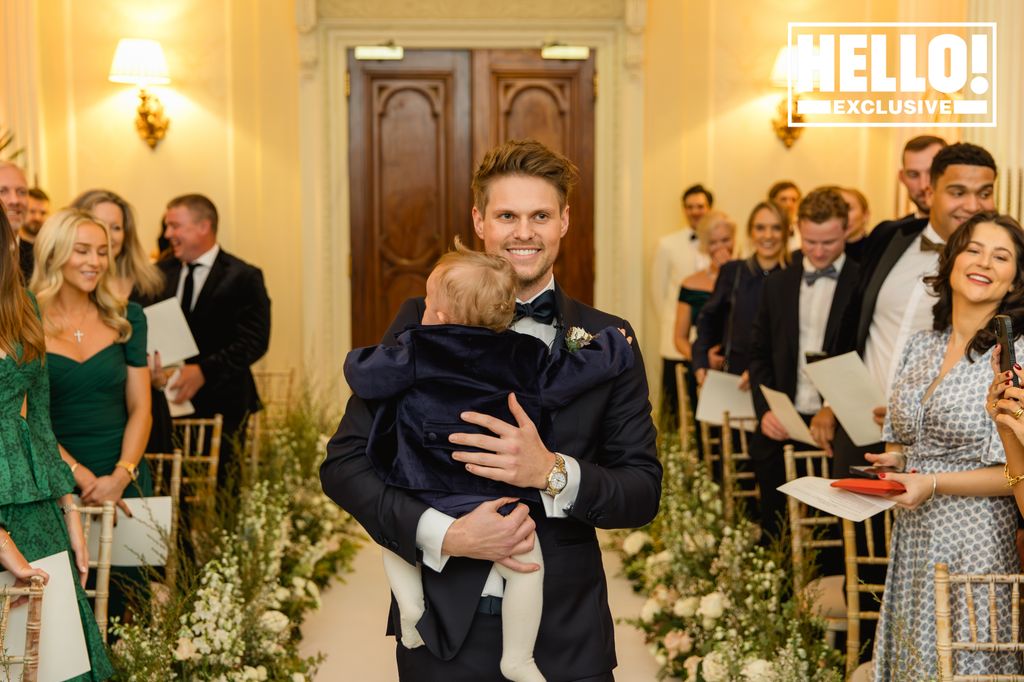 James Taylor of MIC fame holding son Beau at Hedsor House Wedding