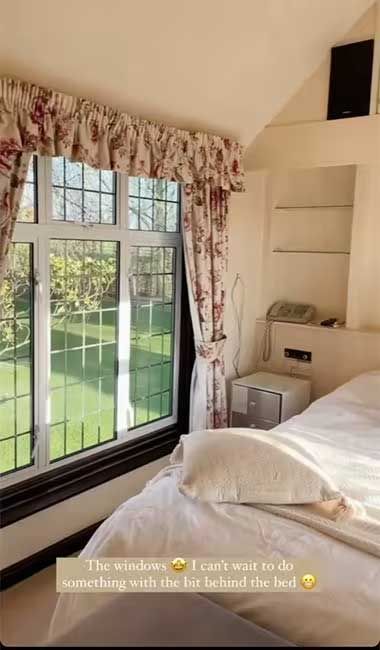 4 a white and pink bedroom with long curtains