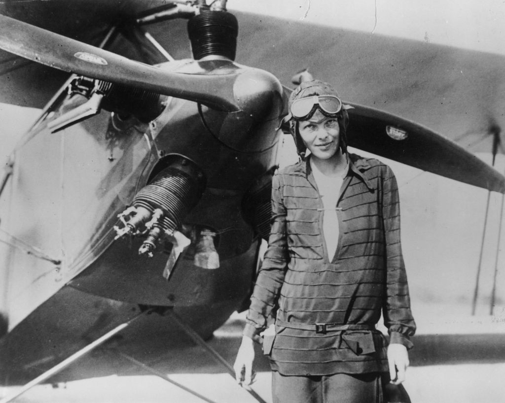 Amelia Earhart stands June 14, 1928 in front of her bi-plane called "Friendship" in Newfoundland