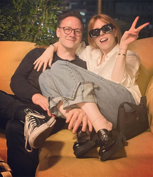 Kevin Clifton and Stacey Dooley on a sofa