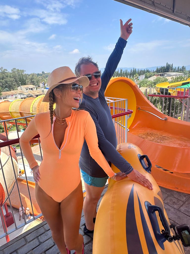 Amanda Holden wearing a orange long sleeve swimsuit on Amanda & Alan's Greek Job