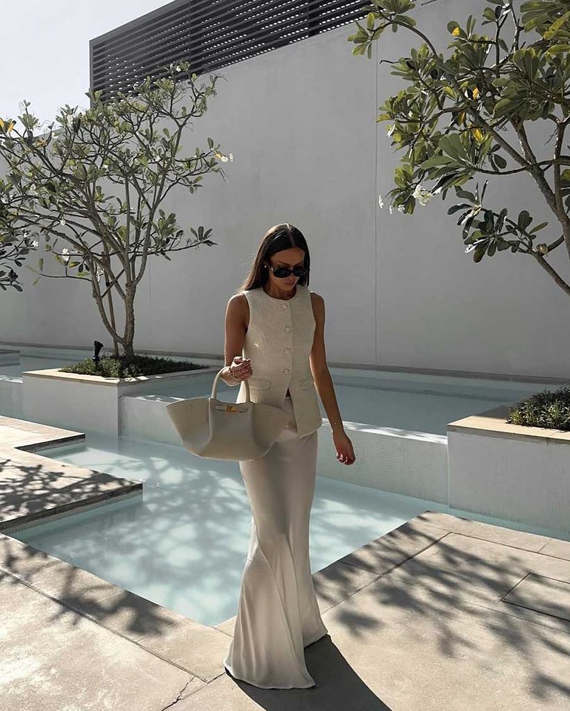 Zoe Witherspoon wears silky maxi skirt