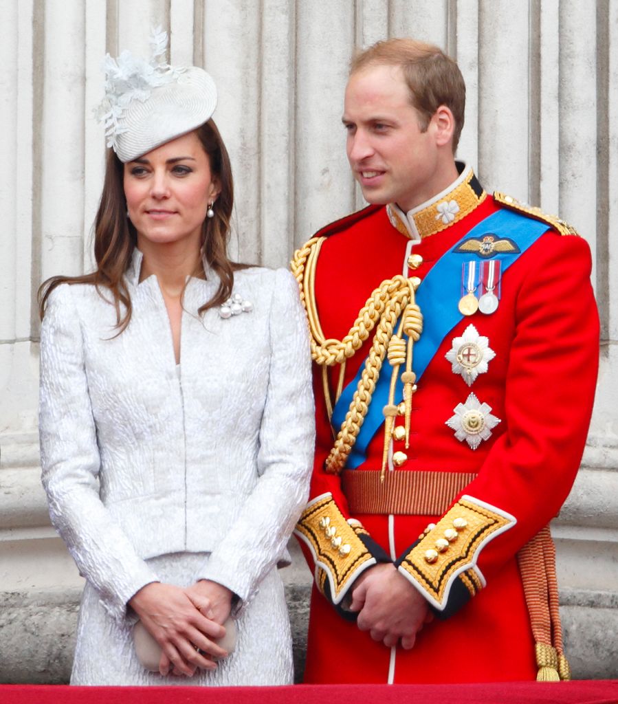 Catherine, Duchess of Cambridge and Prince William, Duke of Cambridge watch the fly-past from the balcony of Buckingham Palace during Trooping the Colour, Queen Elizabeth II's Birthday Parade on June 14, 2014 in London, England.