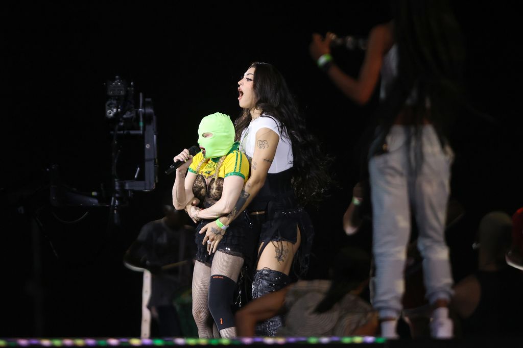 Singer Madonna wears a mask during a rehearsal with Brazilian singer Pabllo Vittar on stage at Copacabana Beach on May 3, 2024 in Rio de Janeiro, Brazil.