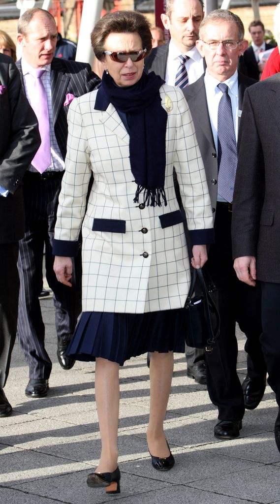 Princess Anne wearing checked coat at Boat Show
