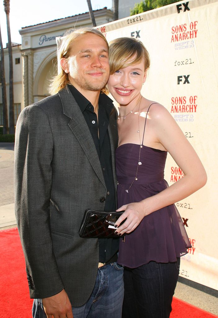 Charlie Hunnam in gray blazer and jeans and girlfriend Morgana in purple top arrive at the FX Series Screening of "Sons of Anarchy" held at Paramount Theater at Paramount Studios on August 24, 2008 