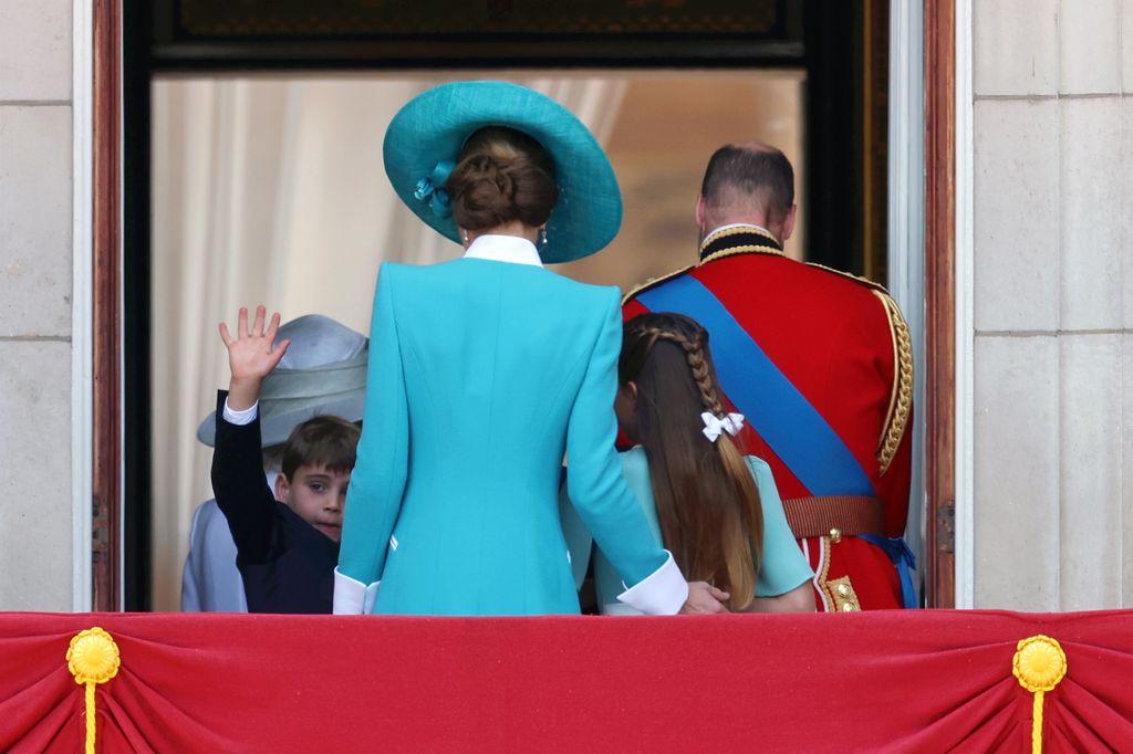 Prince Louis of Wales waves from the balcony at Buckingham Palace during Trooping The Colour 2025