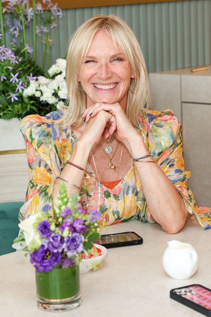 Jo Whiley in floral dress at Emirates suite at Wimbledon