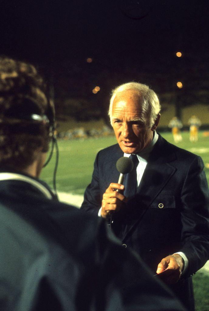 College Football: View of Tom Harmon, father of UCLA QB Mark Harmon, during interview on the sidelines before game vs Nebraska at Rose Bowl Stadium. 
Pasadena, CA 9/9/1972 
George Long