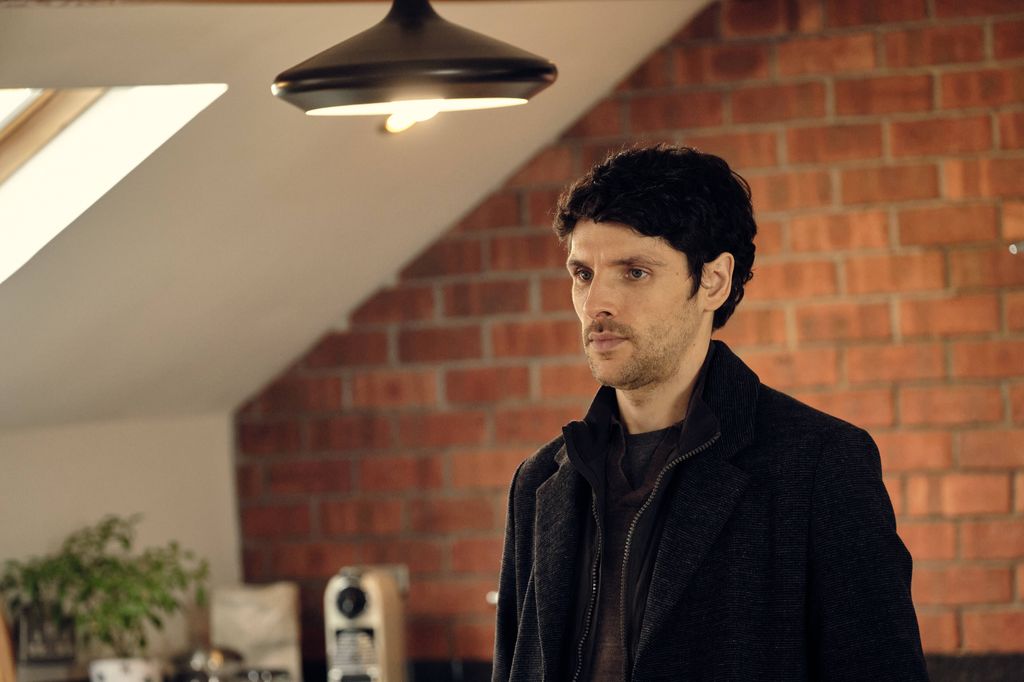 man standing in kitchen