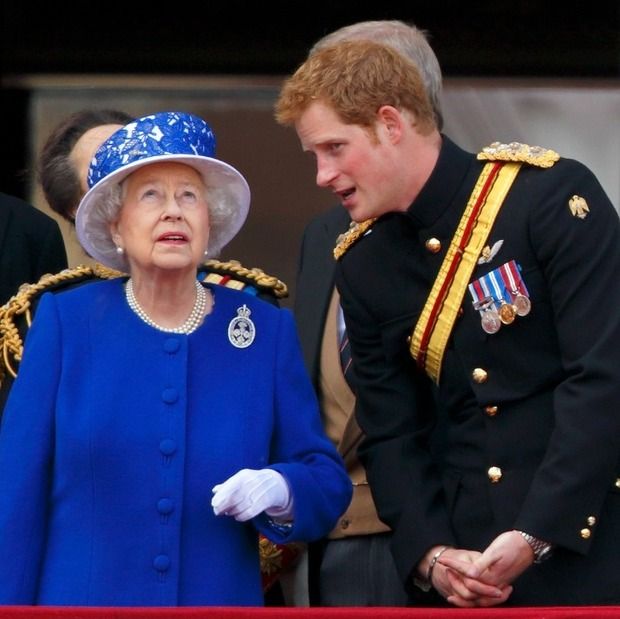 Prince Harry talking to The Queen