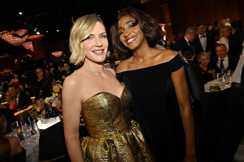 two women posing for photo