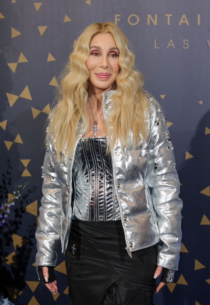 Cher looked incredible in a silver puffer jacket 