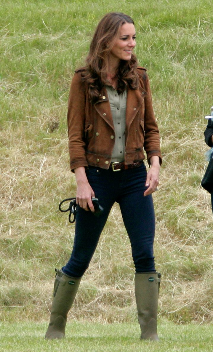 Princess Kate wearing wellies in a brown jacket