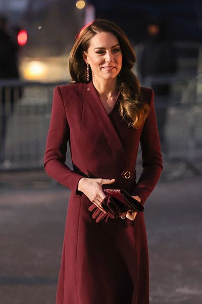 Kate Middleton in a burgundy coat