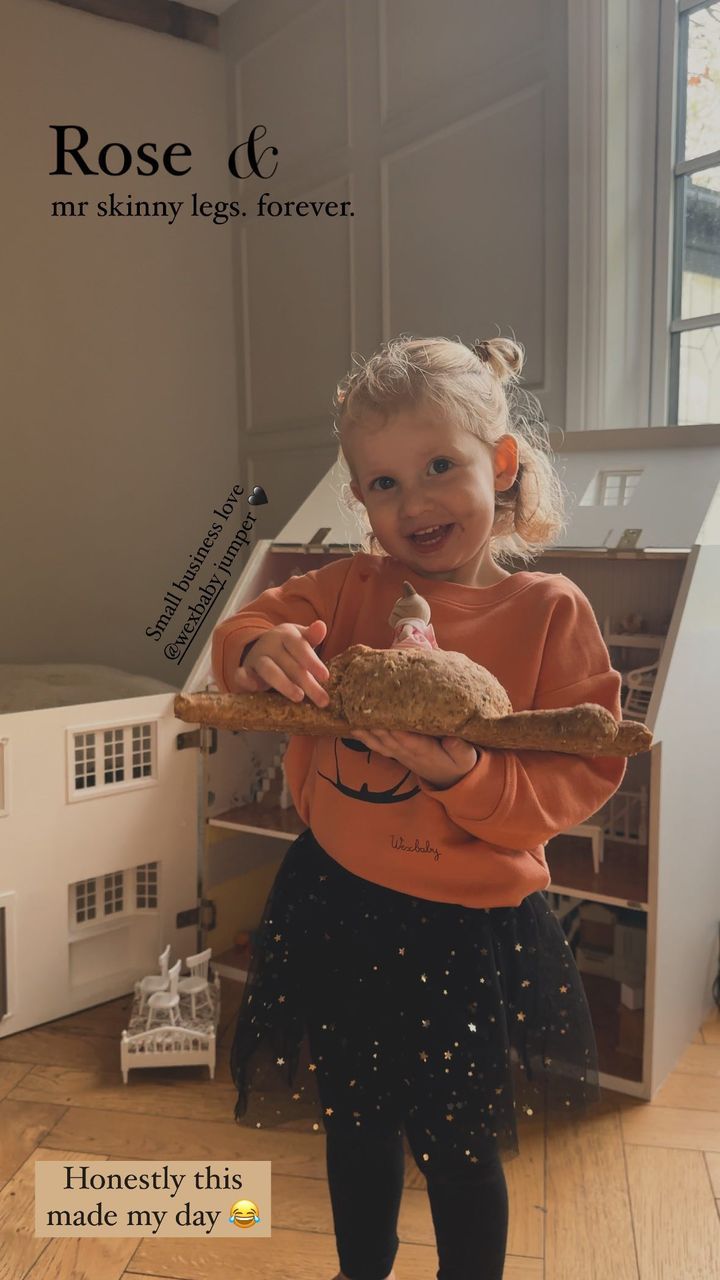 Stacey Solomon's daughter Rose holding her bread spider
