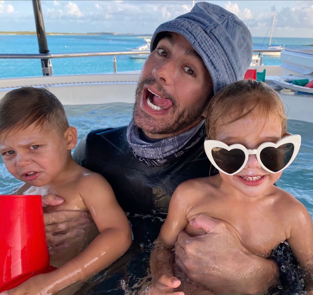 Enrique and the twins in pool