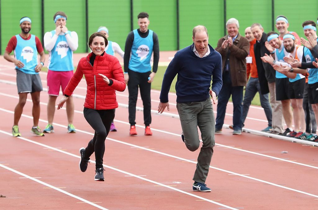 Kate and William running, supported by the public