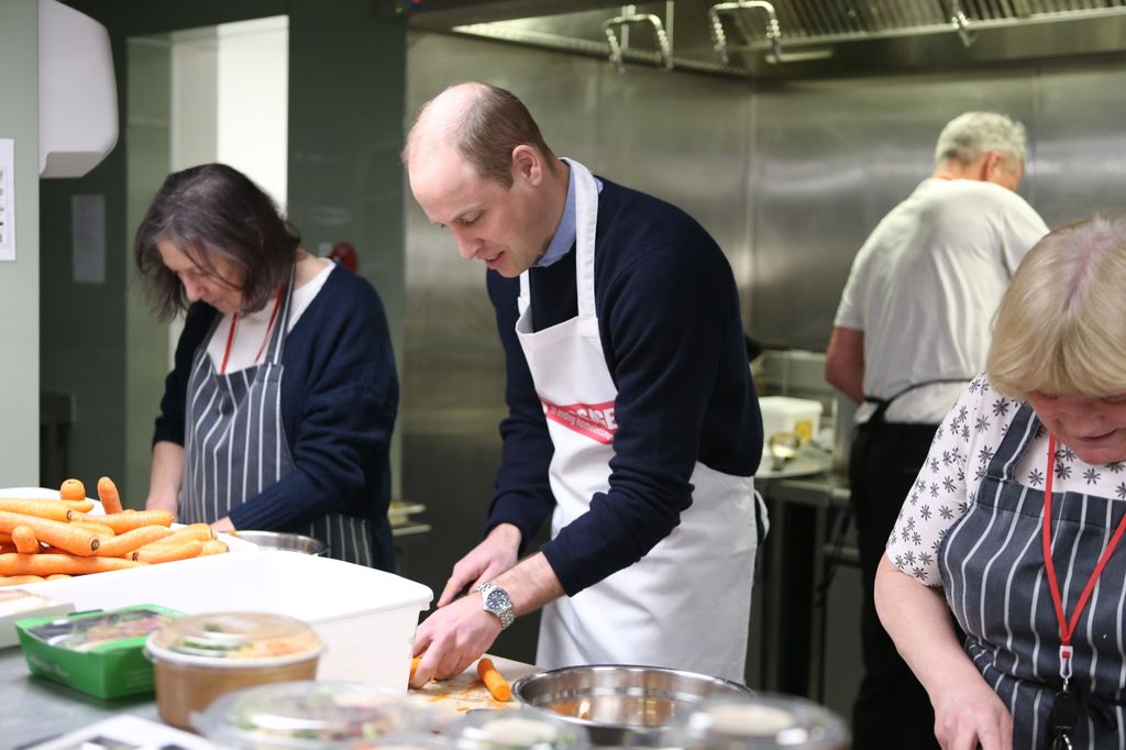 Prince William cooking in industrial kitchen