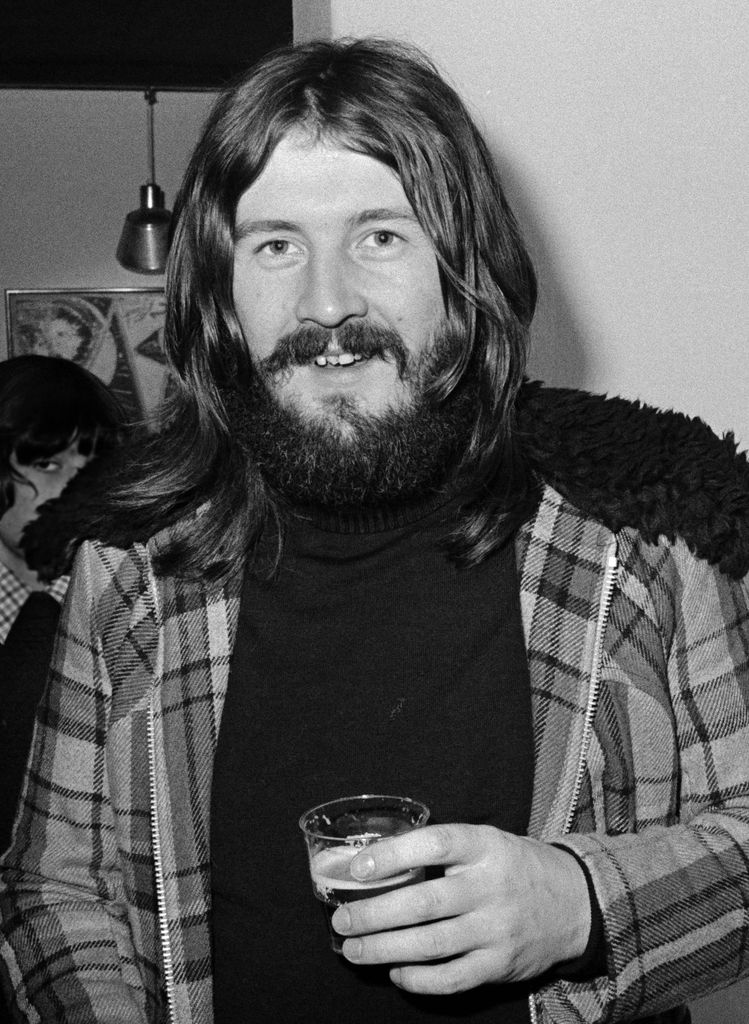 John Bonham of Led Zeppelin drinking a beer