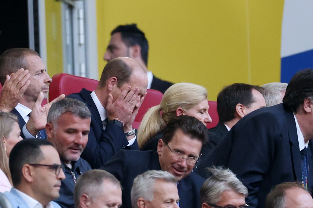 Prince William puts his head in his hands at England match