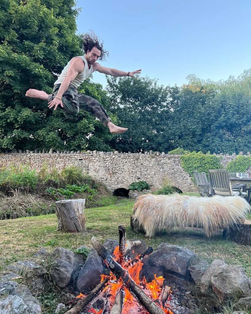 Aaron Taylor-Johnson was pictured performing stunts in his sprawling back garden