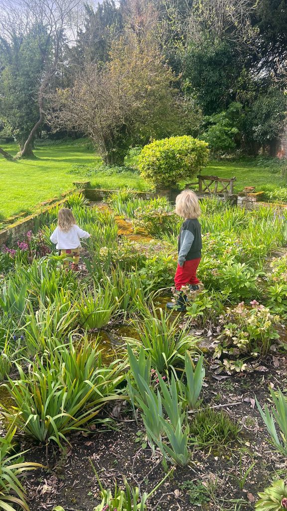 A photo of Romy and Wilfred in their family garden