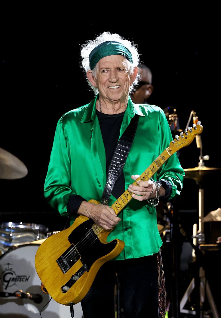 Keith in a green silk shirt 