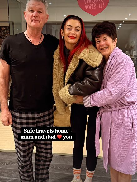 Dianne Buswell standing with her parents