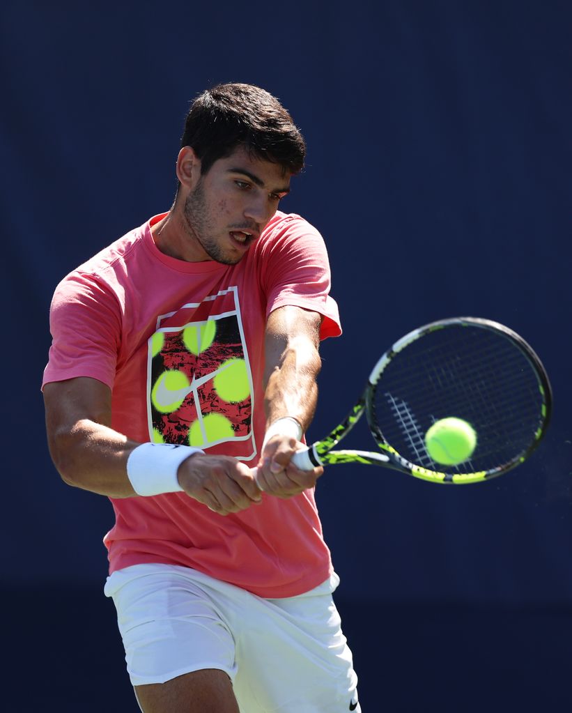 Carlos Alcaraz of Spain plays a backhand during a practice session ahead of the US Open at USTA Billie Jean King National Tennis Center on August 27, 2023 in New York City