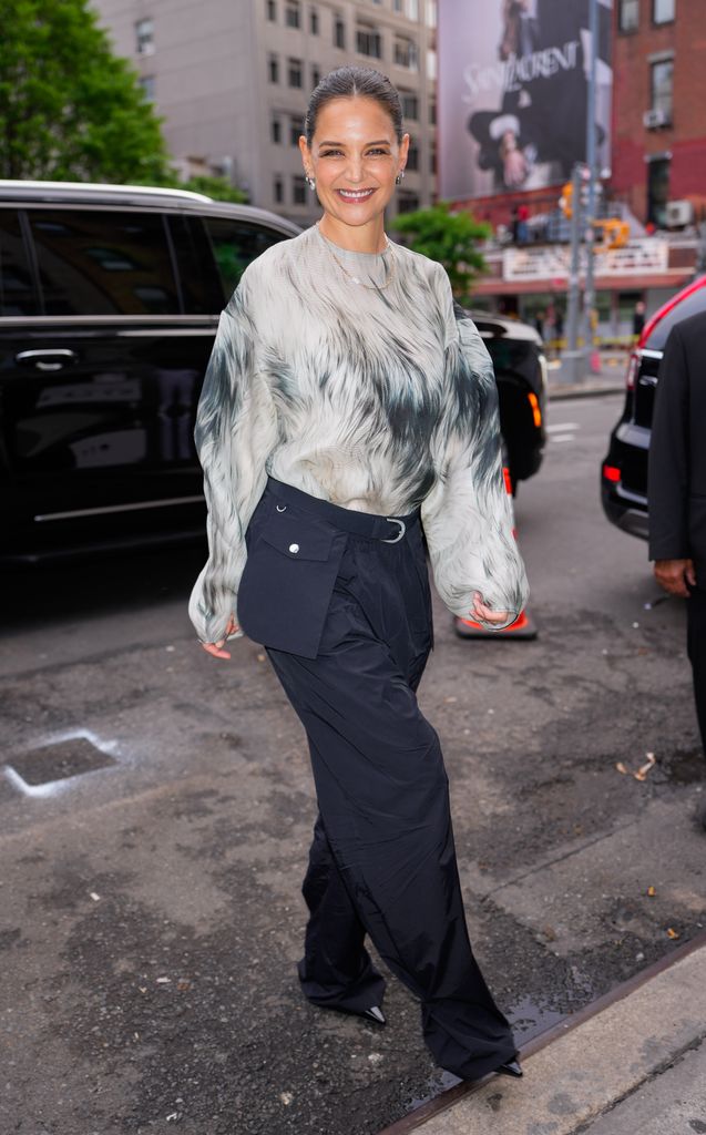 katie holmes smiling at camera walking in nyc
