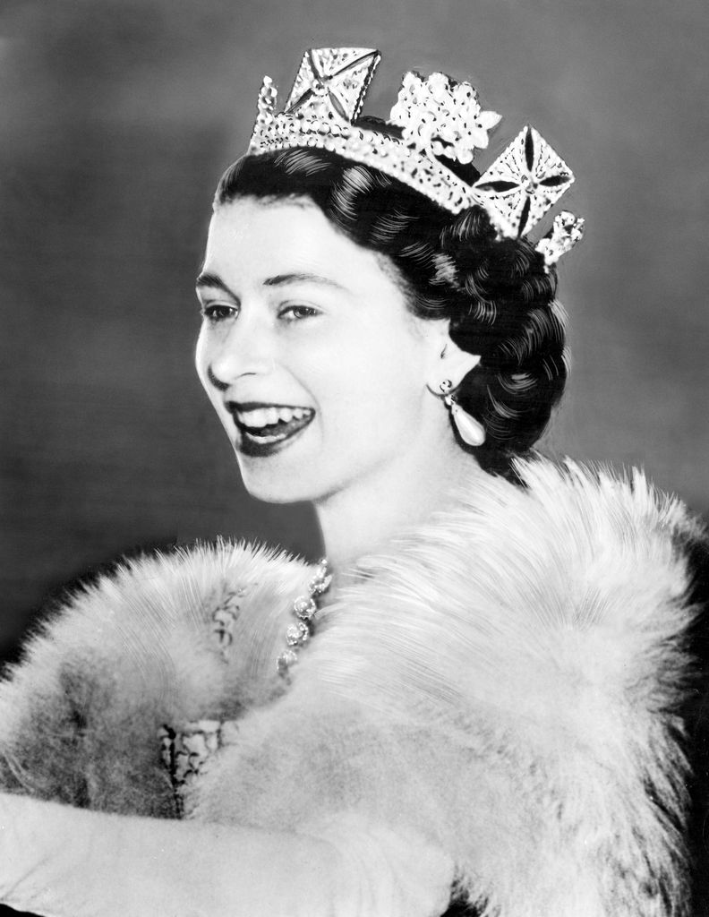 Queen Elizabeth II smiles during her coronation on June 2, 1953