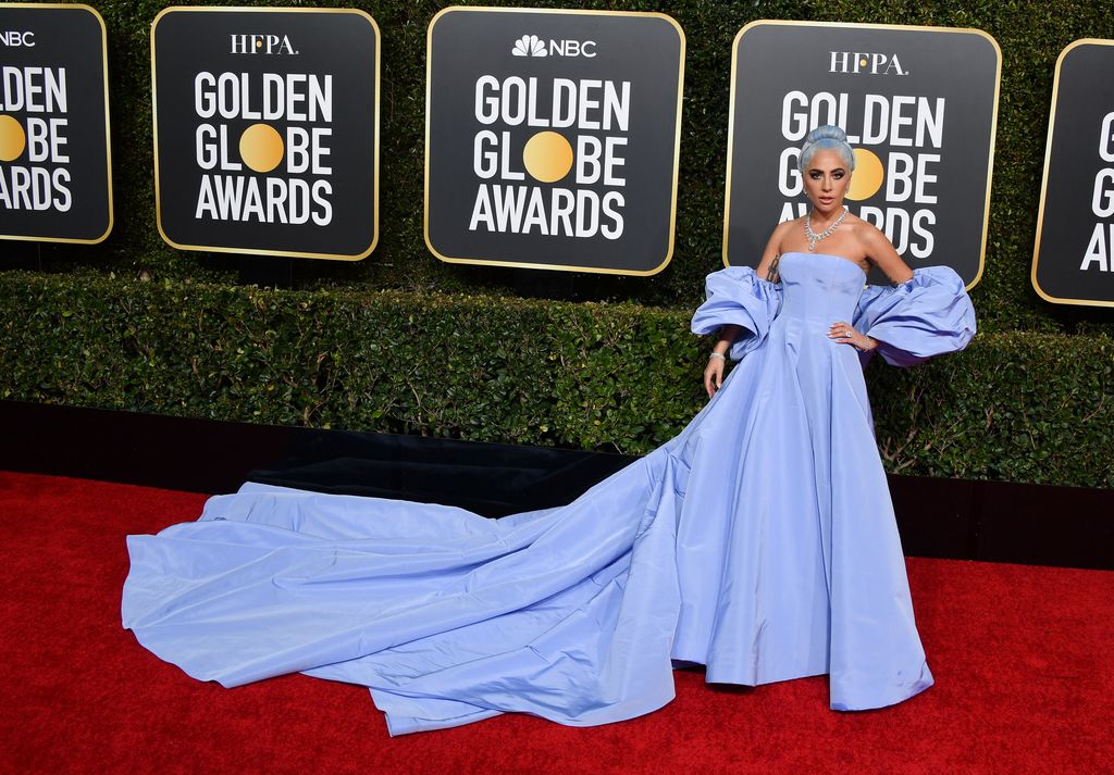 Lady Gaga on red carpet in long blue gown