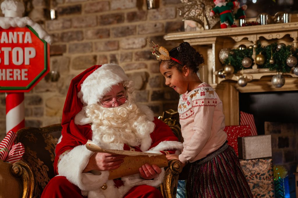 Girl visiting Santa at a Santas grotto