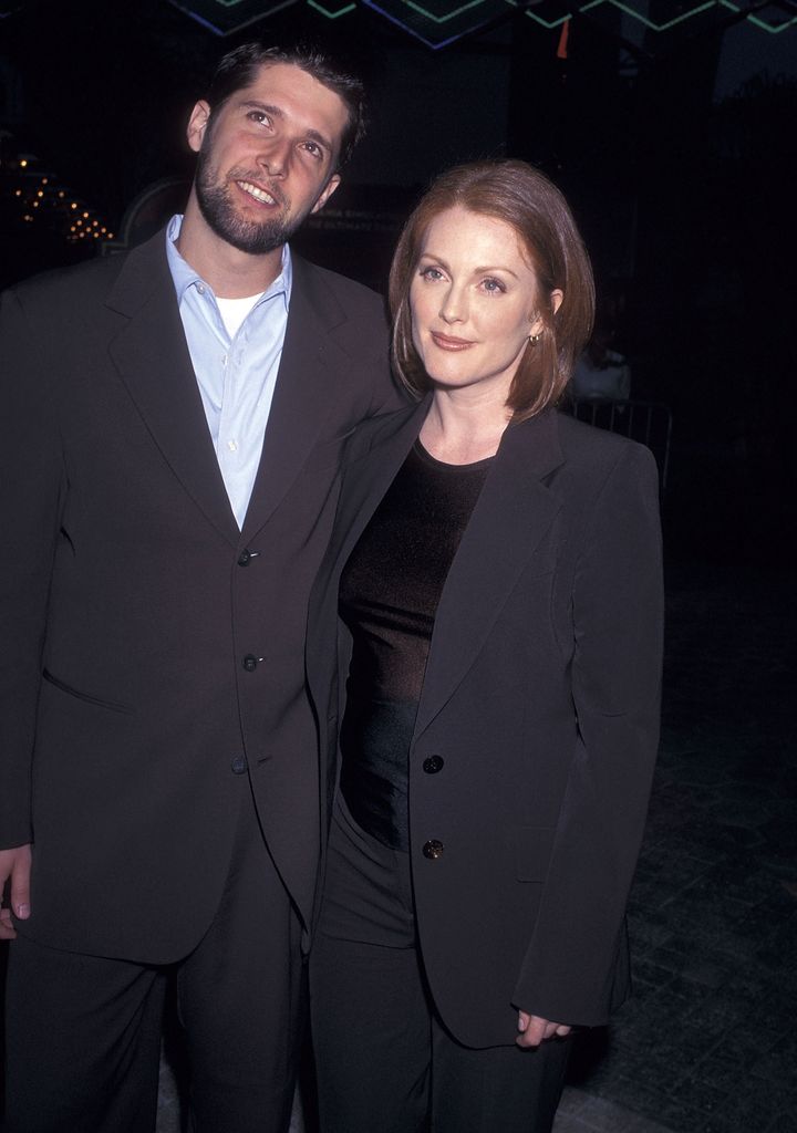 Filmmaker Bart Freundlich and actress Julianne Moore attend "The Lost World: Jurassic Park" Universal City Premiere on May 19, 1997 at Cineplex Odeon Universal City Cinemas in Universal City, California. (Photo by Ron Galella, Ltd./Ron Galella Collection via Getty Images)