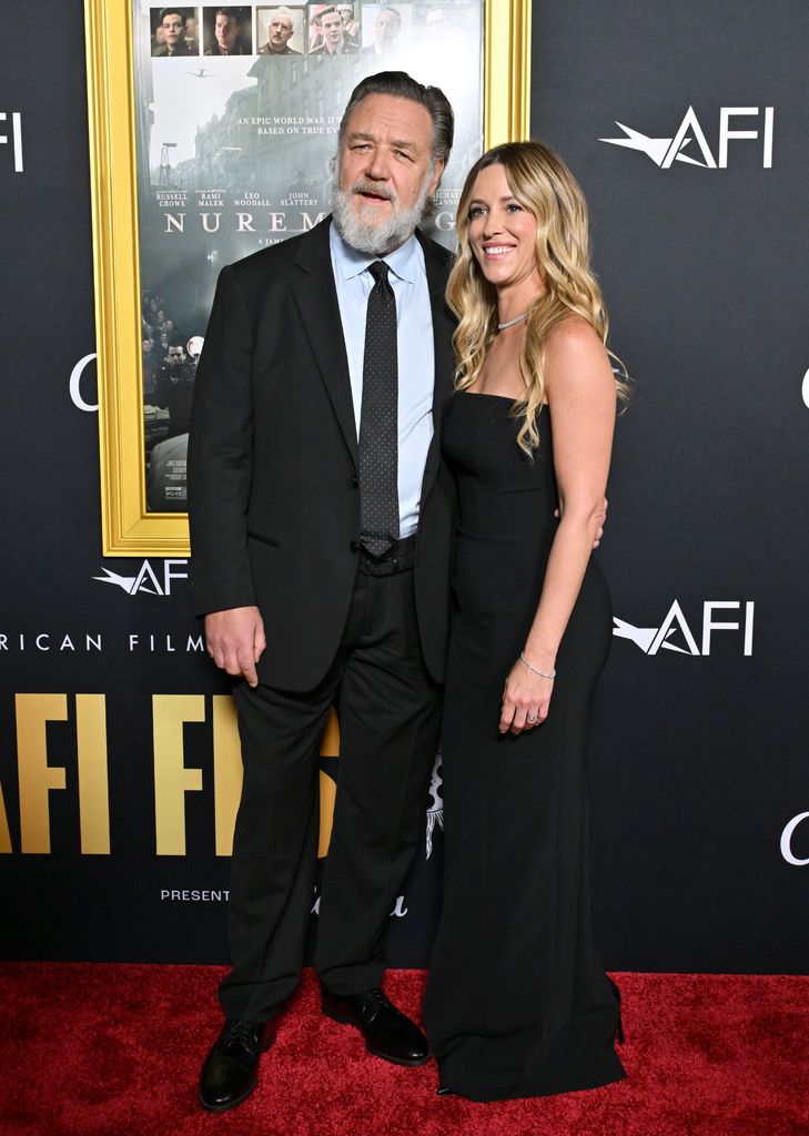 Russell Crowe and Britney Theriot attend the 2025 AFI FEST premiere for Nuremberg
