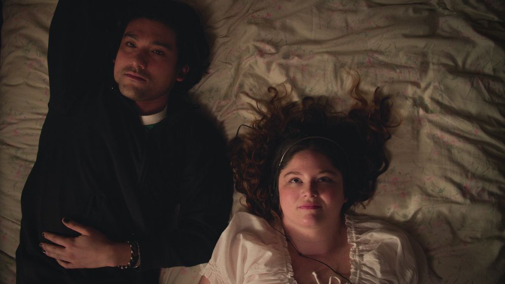 close-up of man and woman lying in bed 