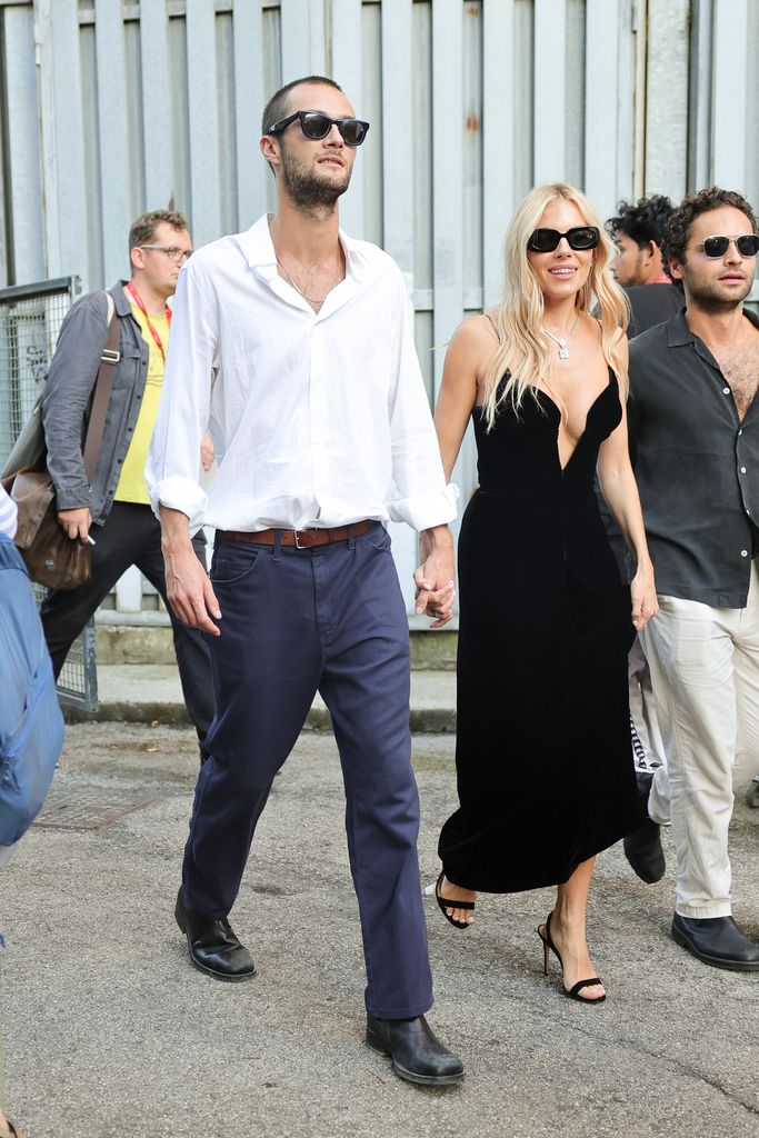 Sienna, clad in vintage Giorgio Armani, took her partner Oli Green as her date for the premiere